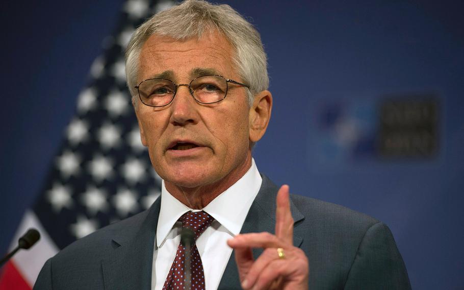Secretary of Defense Chuck Hagel conducts speaks Wednesday, June 4, 2014, at the NATO Headquarters in Brussels Belgium, where he said it is unfair to leap to conclusions about the behavior of Sgt. Bowe Bergdahl before he was captured by the Taliban in 2009.