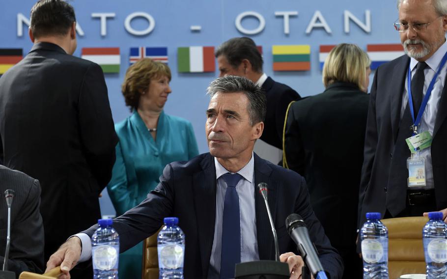 NATO Secretary-General Anders Fogh Rasmussen at the start of the North Atlantic Council meeting in Brussels, Wednesday, June 25, 2014.



