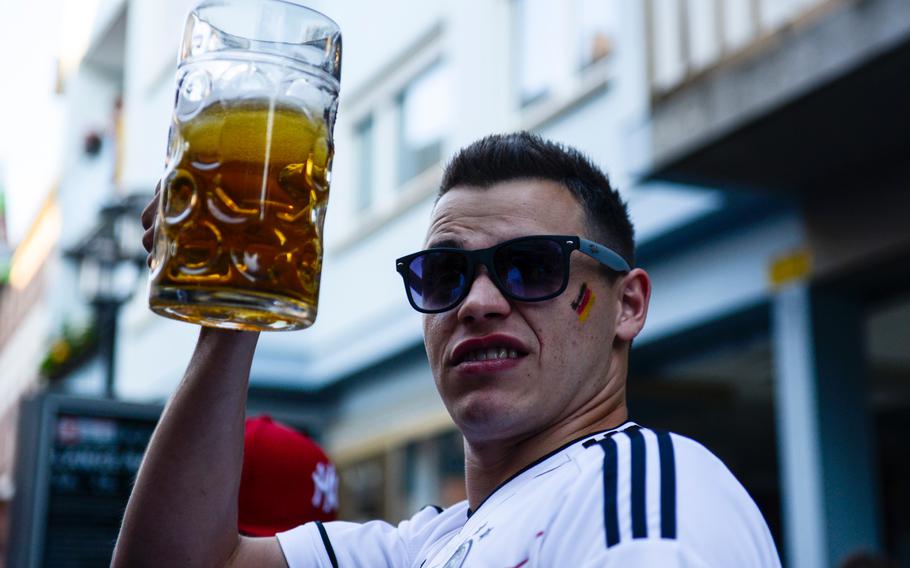 A German soccer fan holds up a liter of beer just after The German national soccer team defeated the U.S. 1-0 during the World Cup, Thursday, June 26, 2014, Kaiserslautern, Germany.

Joshua L. DeMotts/Stars and Stripes