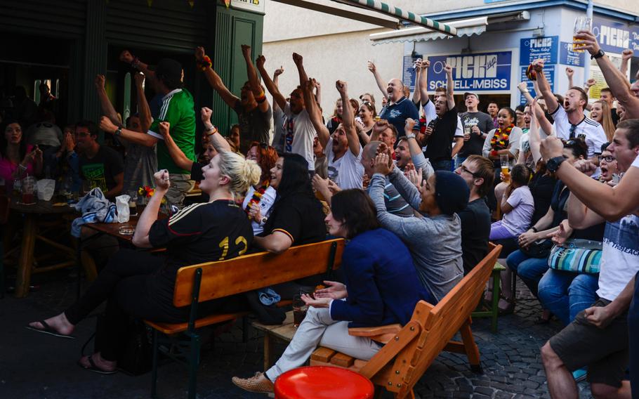 Germans cheer when their team scored a goal against the U.S. in the World Cup, Thursday, June 26, 2014, Kaiserslautern, Germany.

Joshua L. DeMotts/Stars and Stripes