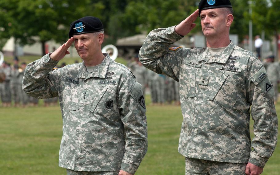 Maj. Gen. Walter Piatt was frocked during his change of command ceremony held at Grafenwoeh, July 21, 2014. Here, he renders a salute with the presiding officer of the ceremony, Lt. Gen. Donald Campbell, the commanding general of U.S. Army Europe and the 7th U.S. Army in Wiesbaden, Germany. 