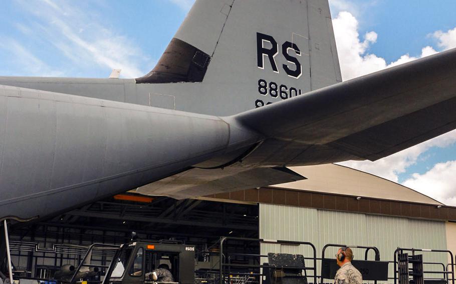 A C-130 Hercules aircraft is unloaded on July 15, 2014 at Ramstein Air Base, Germany.