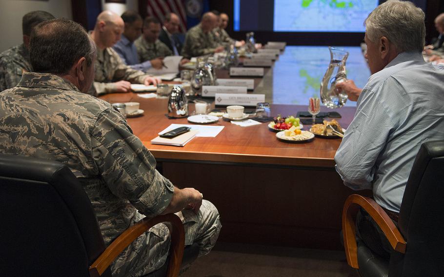 Commander, U.S. European Command, General Phillip Breedlove and Secretary of Defense Chuck Hagel attend a roundtable with staff members at U.S. European Command in Stuttgart, Germany, on August 6, 2014. 