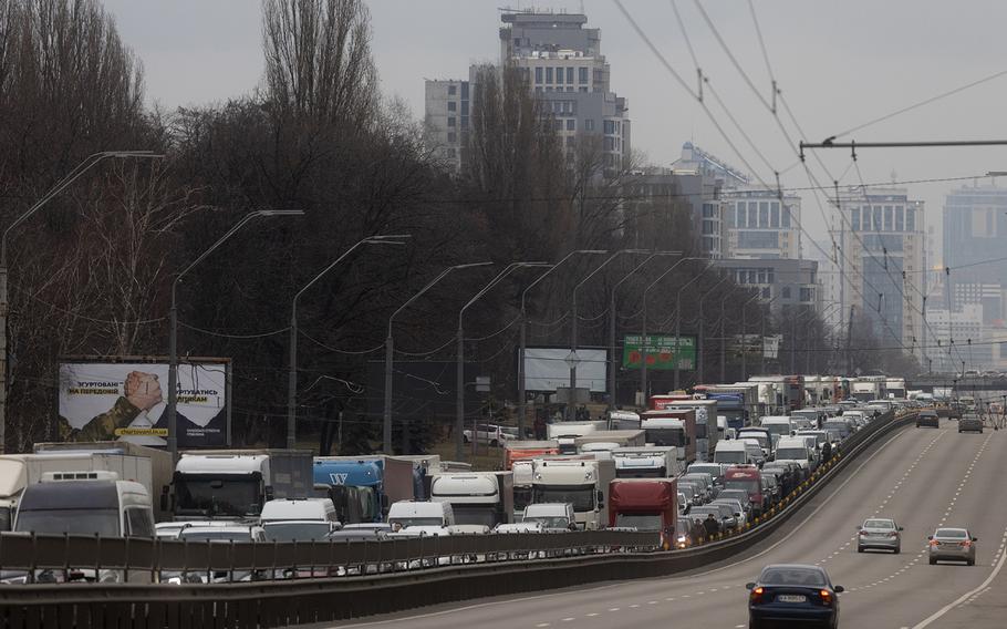 Cars sit at a standstill as people try to leave the city on Feb. 24, 2022, in Kyiv, Ukraine. Overnight, Russia began a large-scale attack on Ukraine, with explosions reported in multiple cities and far outside the restive eastern regions held by Russian-backed rebels. 
