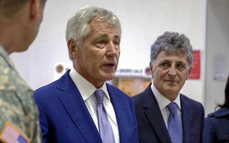 U.S. Secretary of Defense Chuck Hagel and Romanian Minister of Defense Mircea Dusa tour Mihail Kogalniceanu Air Base, Romania, on June 5, 2014. In a Pentagon statement on Friday, Nov. 21, 2014, Hagel offered condolences to the Romania after a military helicopter crash killed eight servicemembers.