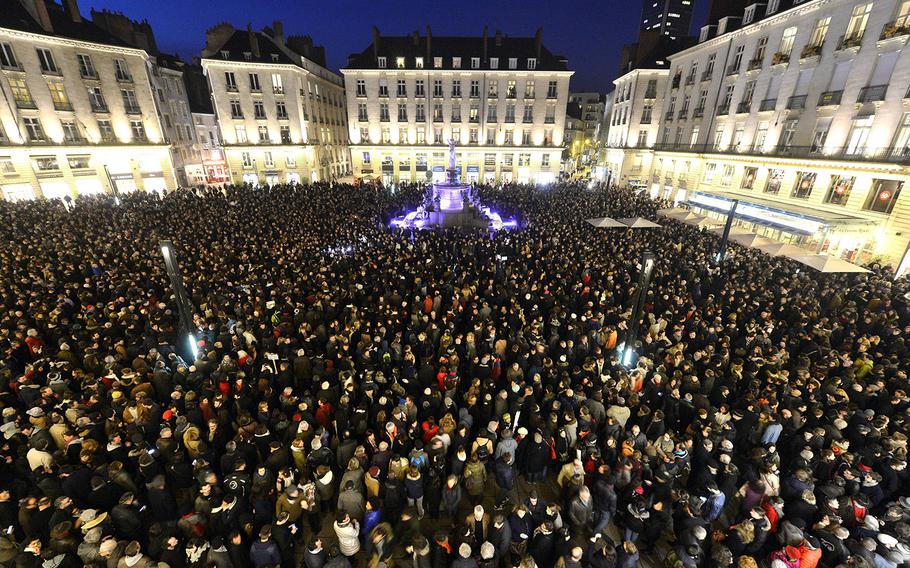 Thousands gather on Jan. 7, 2015, in a rally at the Place Royale in Nantes, France, to pay tribute to those injured and killed in an attack on the French satirical magazine Charlie Hebdo.