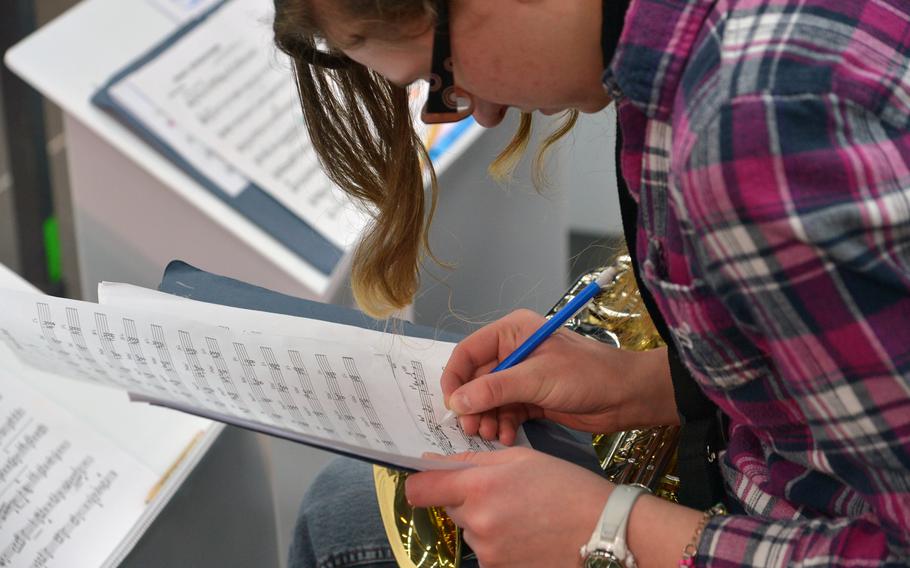 Tenor saxophonist Alexandra Walchli of Ramstein makes some adjustments to the music at the DODDS-Europe Jazz Seminar in Ramstein, Germany, Tuesday, Jan. 13, 2015. Thirty-three musicians from eight high schools participated in this year's event.