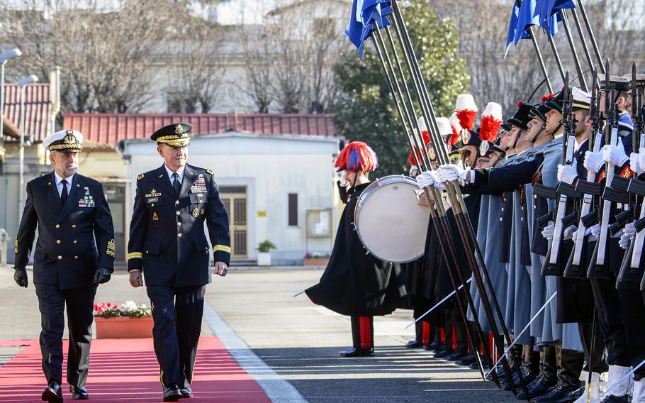 U.S. Army Gen. Martin E. Dempsey, Chairman of the Joint Chiefs of Staff, walks with his Italian counterpart Adm. Luigi Binelli-Mantelli during a pass and review ceremony in Rome, Italy, Jan. 19, 2015.