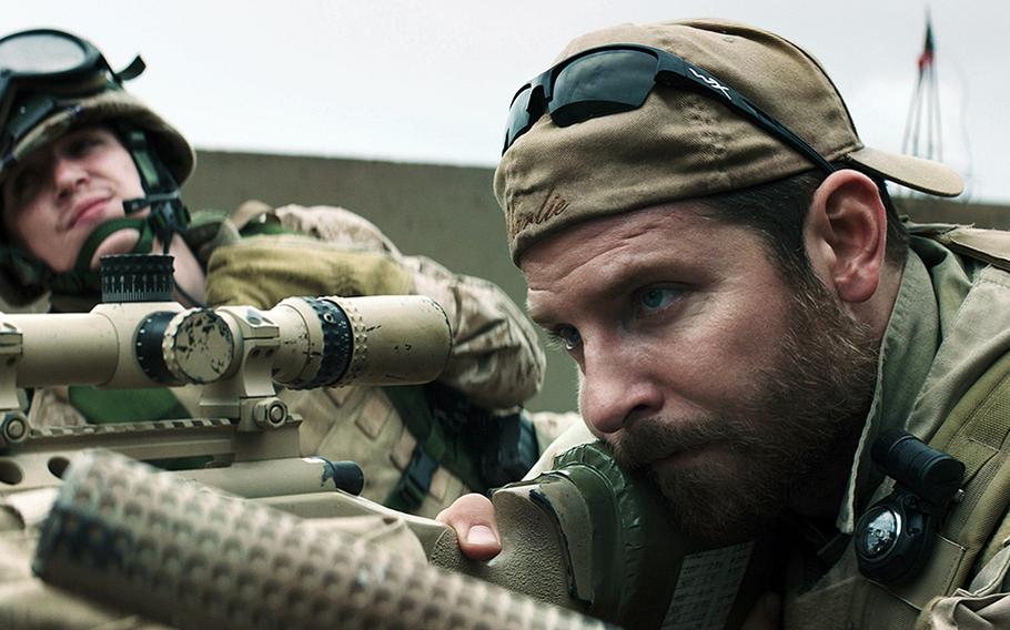 Kyle Gallner, left, portrays Goat-Winston and Bradley Cooper is Chris Kyle in Warner Bros. Pictures' and Village Roadshow Pictures' drama 'American Sniper.'