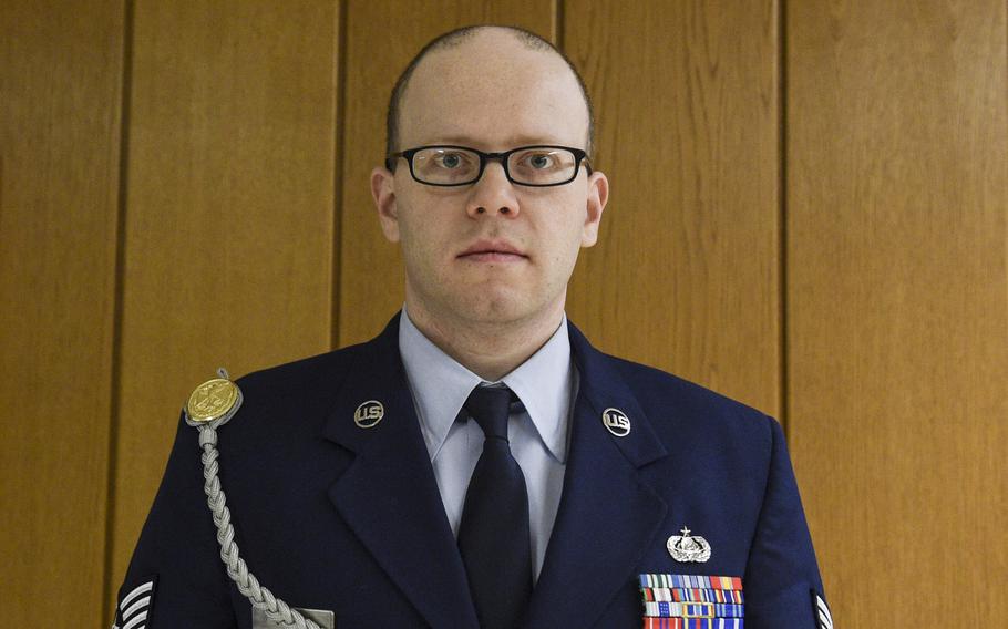 Air Force Staff Sgt. Sean Oliver, seen here, was found guilty of unpremeditated murder Wednesday, Jan. 28, 2015,  in the killing of Navy Petty Officer 2nd Class Dmitry Chepusov, an American Forces Network broadcaster.