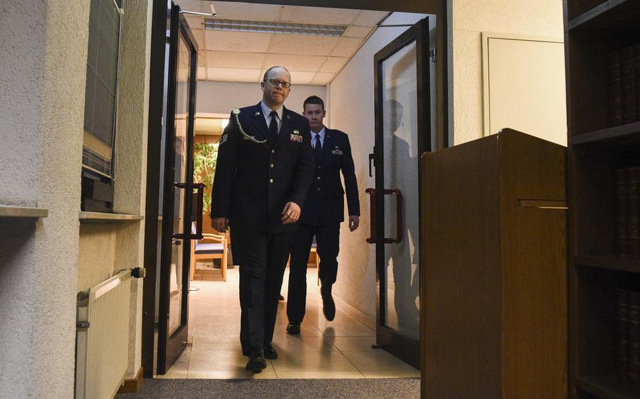 Air Force Staff Sgt. Sean Oliver walks into the courtroom Thursday, Jan. 29, 2015, where he was found guilty a day earlier of unpremeditated murder in the killing of Navy Petty Officer 2nd Class Dmitry Chepusov, an American Forces Network broadcaster.

