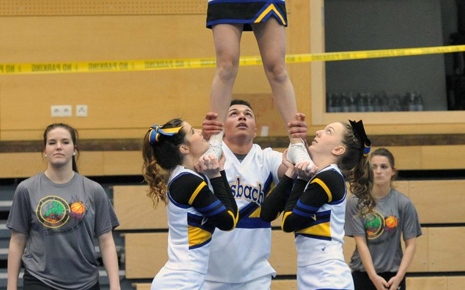 Members of the Ansbach Cougars cheer team perform at the DODDS-Europe cheer competition in Wiesbaden, Germany, Saturday, Feb 21, 2015. They won the Division II competition for the fourth year in a row.