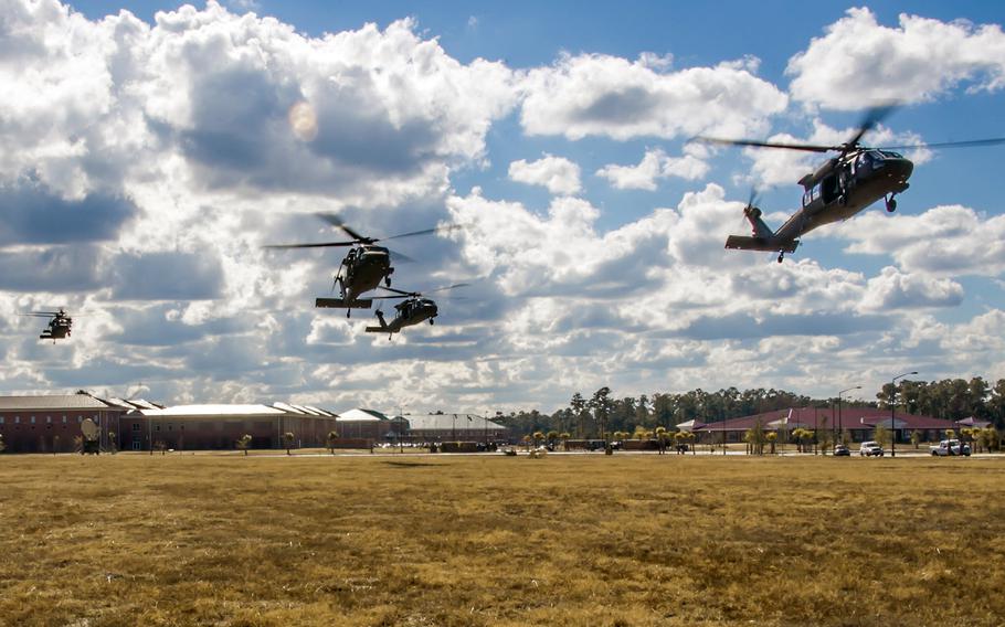 UH-60M Black Hawk helicopters from the 3rd Infantry Division begin to land in unison Dec. 1, 2014, at Fort Stewart, Ga. U.S. Army Europe announced on March 3, 2015,  that 450 soldiers and 25 Black Hawk helicopters from the unit will be deploying to Illesheim, Germany, later in March as part of Operation Atlantic Resolve. 