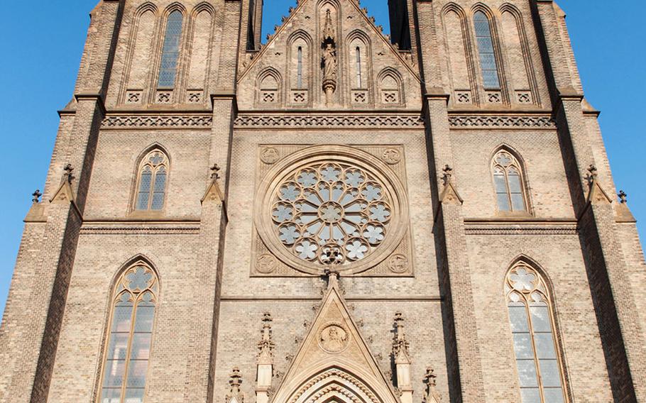 Pro-American demonstrators rallied in support of the U.S. Army's convoy operation in Prague's Peace Square against the background of the Church of St. Ludmila, Saturday, March 28, 2015.