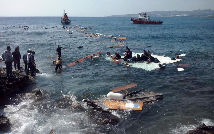 A vessel carrying hundreds of migrants sank off the coasts of Rhodes island in southeastern Aegean Sea on Monday, April 20, 2015, local authorities said. At least 3 people died. European Union officials gathered for an emergency meeting Monday after several recent deadly disasters focused international attention on the surge in migrants attempting the risky voyage across the Mediterranean Sea.