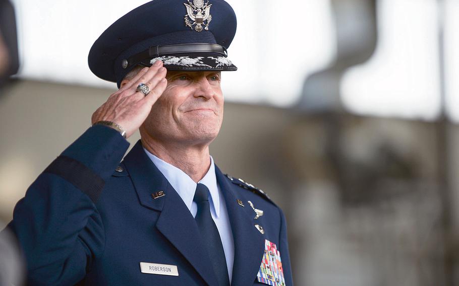 Lt. Gen. Darryl L. Roberson, 3rd Air Force commander, salutes a unit commander during the 3rd Air Force assumption-of-command ceremony June 11, 2014, at Ramstein Air Base, Germany. The 3rd Air Force commander is packing his bags for Texas after less than a year on the job. 

Joshua L. DeMotts/Stars and Stripes
