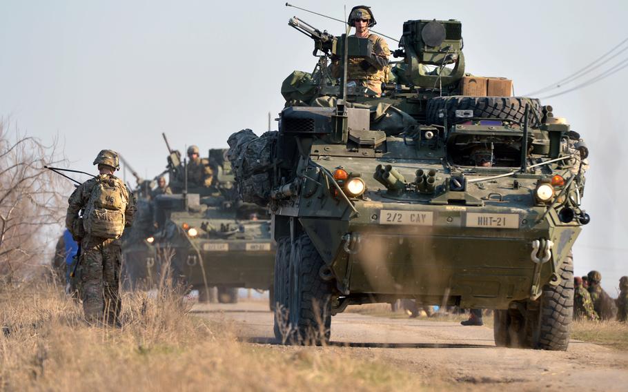 Strykers from 2nd Squadron, 2nd Cavalry Regiment, roll into the Smardan training area in Romania, March 24, 2015. The 2nd Cavalry Regiment has received initial approval for more-powerful guns to mount on the unit's Stryker vehicles, a move that comes after the Vilsek, Germany-based unit expressed a need for more-lethal weaponry, U.S. Army Europe said.


