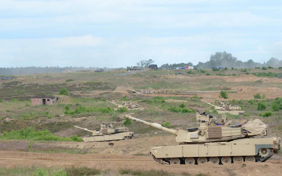 Tanks from the U.S. Army's 3rd Infantry Division take part in a combined arms live-fire exercise as part of Saber Strike 15 at the Drawsko Pomorskie Training Area, Poland, June 16, 2015. 
 
Brandon Anderson/U.S. Army