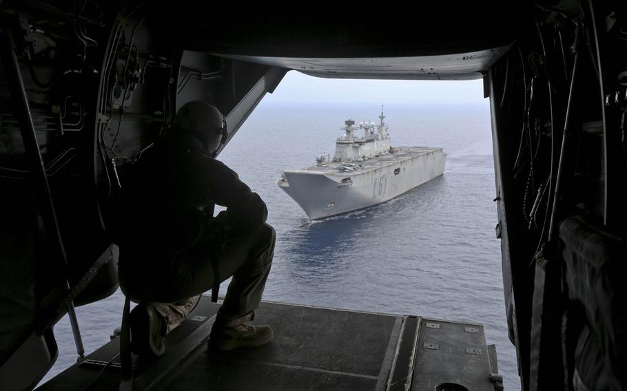 An MV-22 Osprey tilt-rotor aircraft departs the Spanish amphibious assault ship Juan Carlos I during a bilateral carrier qualification near Naval Station Rota, Spain, on June 18, 2014. The landing was the first for an Osprey aboard the warship, one of Spain's newest. The Marines are looking at whether foreign ships like Juan Carlos I can serve in a pinch as platforms for Osprey-based crisis-response units. 