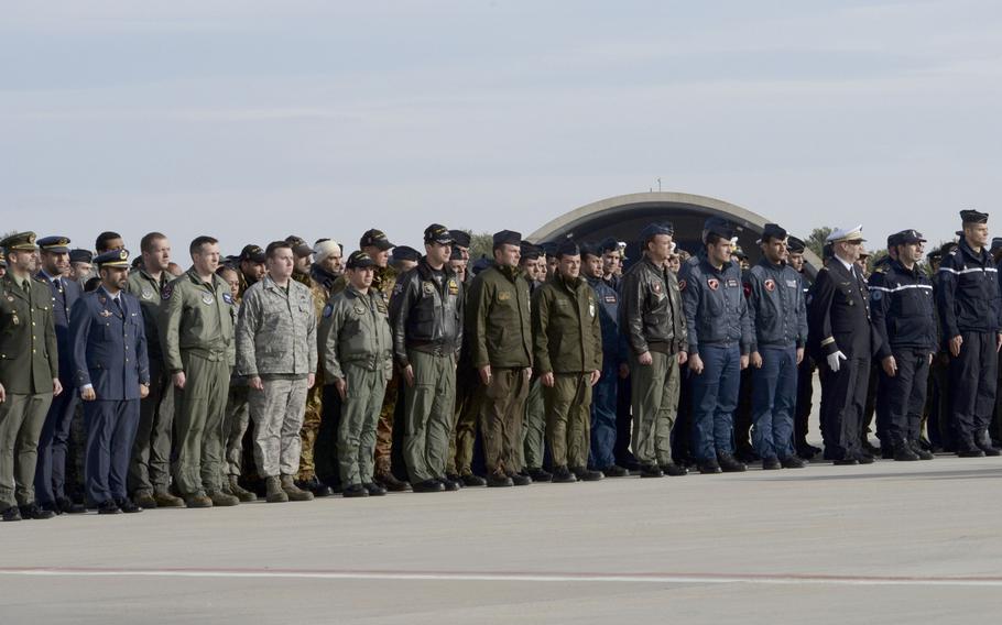 Airmen of the 48th Fighter Wing pay their respects alongside NATO allies at a memorial service honoring fallen members of the French Air Force at Los Llanos Air Base, Albacete, Spain, Jan. 29, 2015. Eleven airmen from the Greek and French air forces lost their lives after a Greek F-16 crashed during a NATO exercise. A safety investigation found that a loose checklist inside the cockpit was the likely cause of the crash.