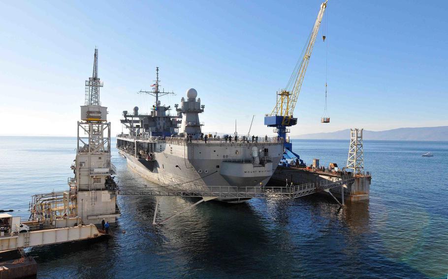 The USS Mount Whitney is tugged into the staging area to begin the dry dock process in the Viktor Lenac Shipyard in Rijeka, Croatia, on Jan. 19, 2015. The flagship of U.S. 6th Fleet, the Mount Whitney was in the final stages of a scheduled overhaul on July 31, 2015, when a fire broke out on board. No one was injured in the blaze, which is under investigation. 