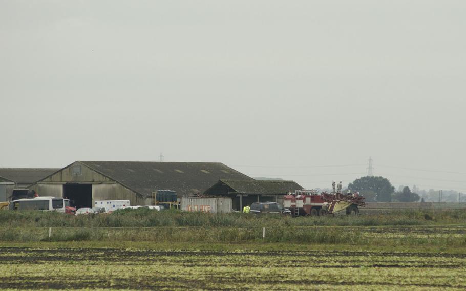 Farm buildings stand near the site of a U.S. F/A-18 crash in Redmere, England, on Wednesday, Oct. 21, 2015. A Marine pilot was killed in the incident.
