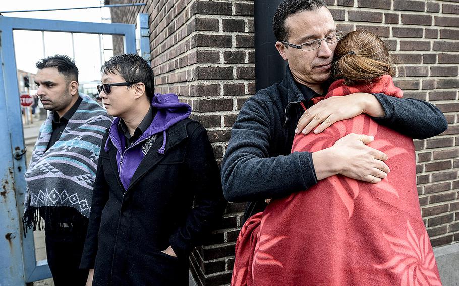 Evacuated passengers near Brussels Airport in Zaventem, Belgium, on Tuesday, March 22, 2016, after attacks in the Belgian capital killed dozens.