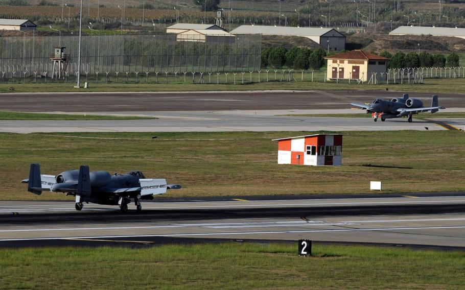 Two A-10C Thunderbolt II attack aircraft taxi down the flight line after landing at Incirlik Air Base, Turkey, Oct. 15, 2015. The aircraft are deployed to Turkey in support of the coalition effort against the Islamic State and Operation Inherent Resolve.  