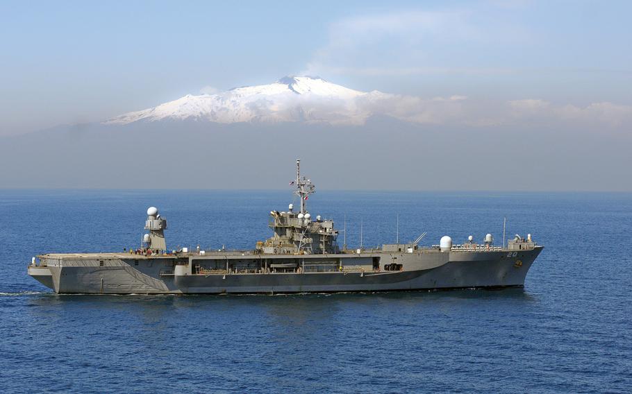  The U.S. 6th Fleet flagship USS Mount Whitney underway past Mount Etna supporting Joint Task Force Odyssey Dawn, March 25, 2011.


