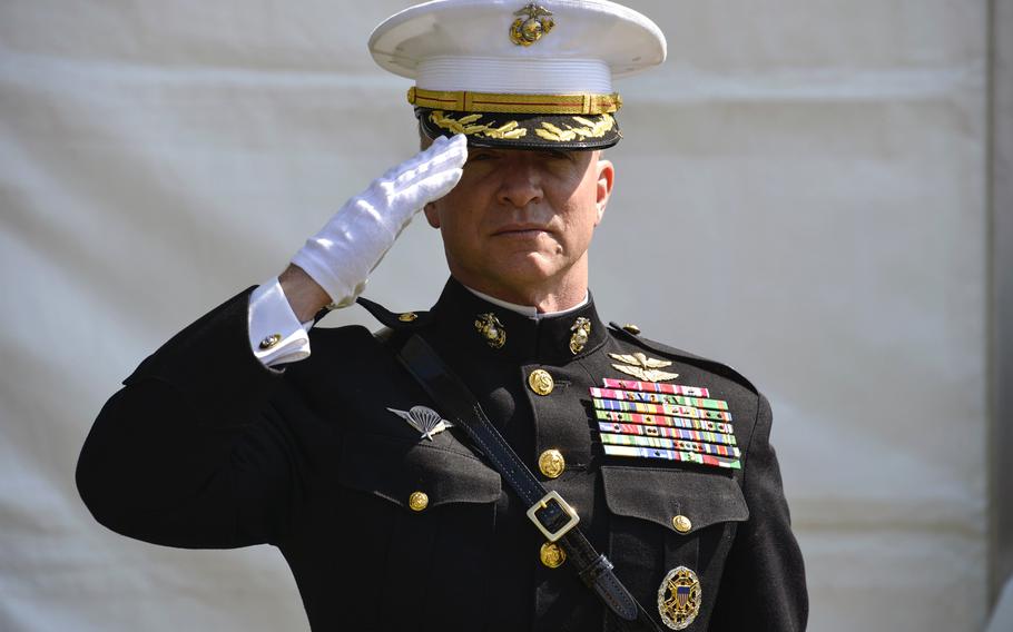 U.S. Marine Corps Col. Philippe Rogers, land forces planner for the U.S. military delegation to NATO, salutes as Taps plays during the Lafayette Escadrille Memorial 100th anniversary ceremony in Marnes-la-Coquette, France on Wednesday, April 20, 2016. 

