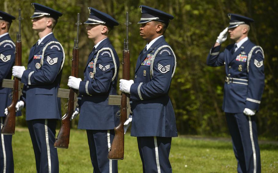 A U.S. Air Force Honor Guard fire team from Spangdahlem Air Base, Germany, awaits the command to perform a 21-gun salute during the Lafayette Escadrille Memorial 100th anniversary ceremony in Marnes-la-Coquette, France on Wednesday, April 20, 2016. Airmen from the U.S. Air Force and their French counterparts, along with civilians from both countries, paid tribute to the more than 200 men who served with and the sacrifices of the 68 American airmen who died fighting for the French prior to the Americans 1917 entry into World War I. 

