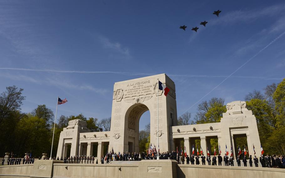 Four U.S. Air Force F-22 Raptors fly over the Lafayette Escadrille Memorial in Marnes-la-Coquette, France on Wednesday, April 20, 2016, during a ceremony honoring the 268 Americans who joined the French air force before the U.S. officially engaged in World War I.  In addition to the F-22s, a U.S. Air Force B-52 Stratofortress bomber, four French air force Mirage 2000Ns and a World War I-era Steerman PT-17 biplane performed flyovers during the ceremony commemorating the 100th anniversary of the Layfette Escadrille's formation. The ceremony also paid tribute to the 68 American airmen who died while serving with the unit. 


