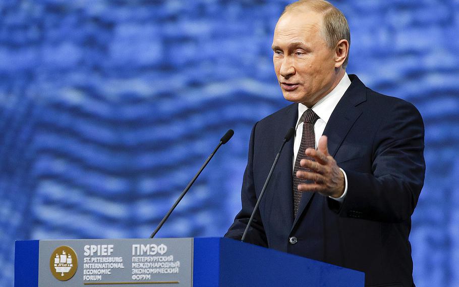 Russian President Vladimir Putin gestures as he addresses the St. Petersburg International Economic Forum in St.Petersburg, Russia, Friday, June 17, 2016.
