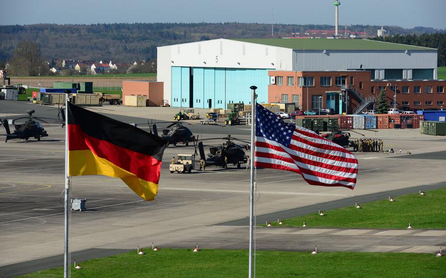 U.S. and German flags fly outside 12th Combat Aviation Brigade Headquarters overlooking Katterbach Army Airfield in Ansbach, Germany, in April 2016. Americans were not among those injured when an asylum-seeker blew himself up after being denied entry to a music festival in Ansbach late Sunday, July 23, 2016, U.S. Army officials said. 