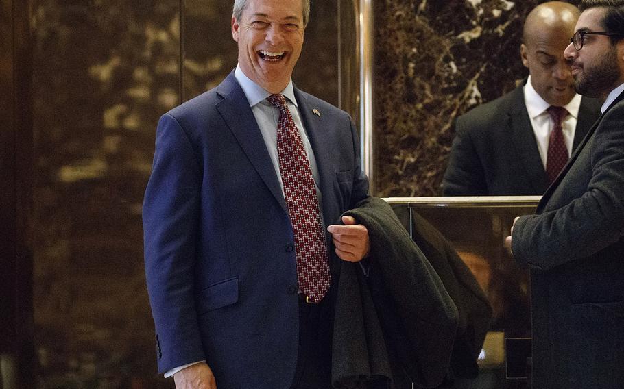 In this Saturday, Nov. 12, 2016 file photo, U.K. Independence Party leader Nigel Farage smiles as he arrives at Trump Tower in New York.