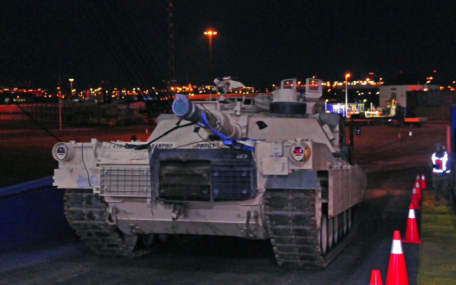 An Army M1 Abrams tank is offloaded from a cargo ship, Jan. 6, 2017, at a port in Bremerhaven, Germany. Soldiers of the 3rd Armored Brigade Combat Team, 4th Infantry Division, out of Fort Carson, Col., are receiving their equipment before moving to Poland for a nine-month deployment.