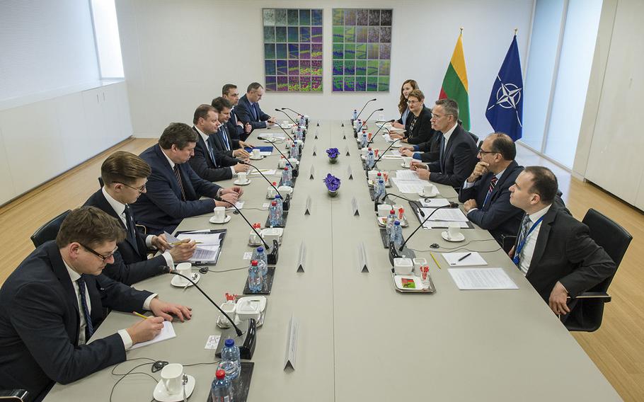 NATO Secretary General Jens Stoltenberg, center right, attends a meeting on Tuesday, Feb. 14, 2017, as Saulius Skvernelis,  Prime Minister of the Republic of Lithuania, visits. Stoltenberg said Tuesday that the alliance will review its command structure to ensure it can respond to new threats.
