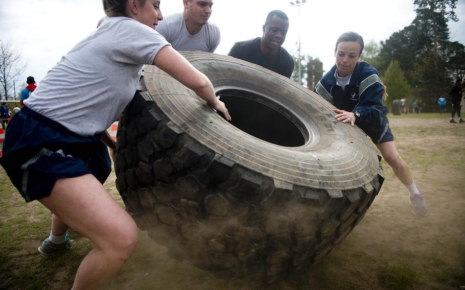 A team from the 86th Logistics Readiness Squadron flips a tire during the annual Courage, Leadership, Education, Advocacy and Respect Challenge at Ramstein Air Base, Germany, on Friday, April 14, 2017.


