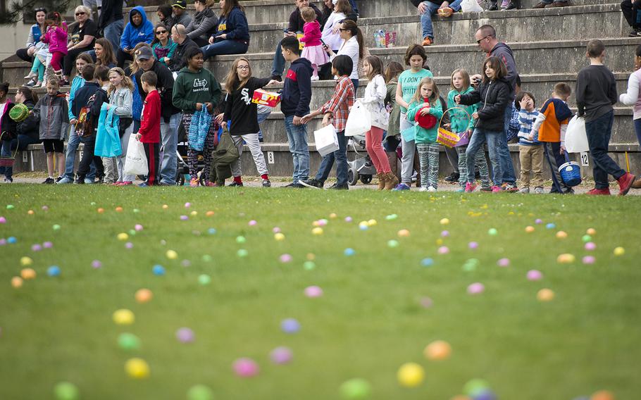 Children line up to search for eggs during the annual Easter Egg Hunt at Ramstein Air Base, Germany, on Saturday, April 15, 2017.
