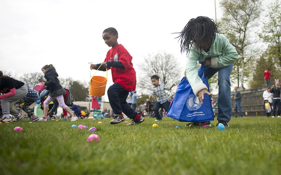 Children search for eggs during the Easter Egg Hunt at Ramstein Air Base, Germany, on Saturday, April 15, 2017.
