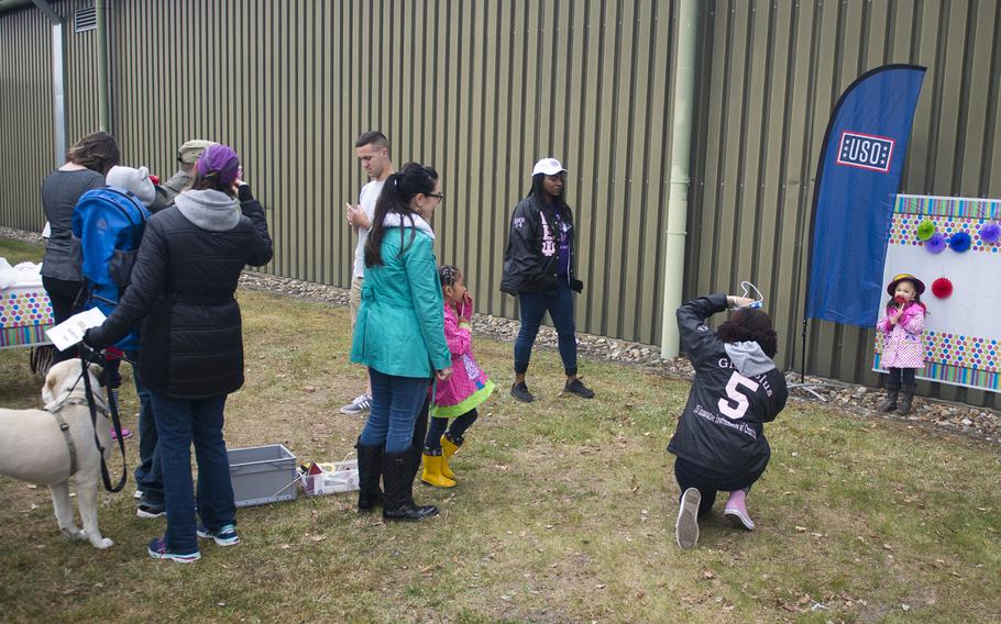 Families line up for their Kinder Volksmarch passports at Rhine Ordnance Barracks, Germany, on Saturday, April 22, 2017.


