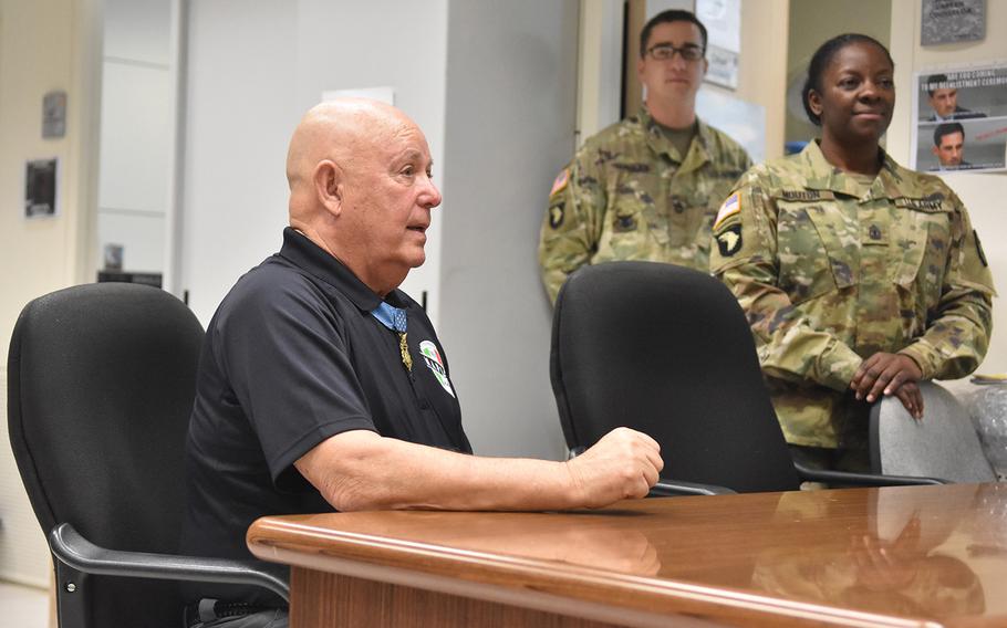 Medal of Honor recipient Gary Littrell talks to soldiers at NATO Allied Joint Force Command in Lago Padria, Italy, on May 12, 2017. 