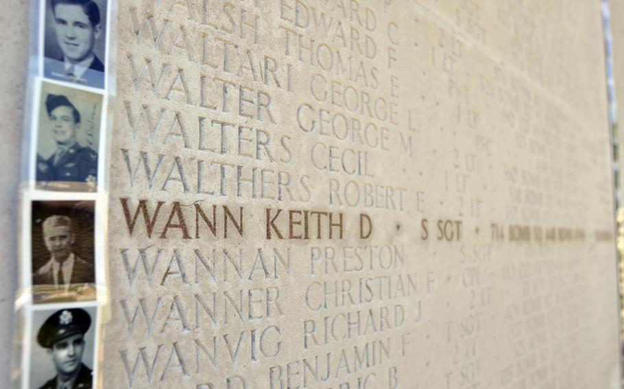 A photograph of Sgt. Keith Wann on the Wall of the Missing at the Cambridge American Cemetery and Memorial in Cambridge, England, Friday, May, 26, 2017. More than 4,000 photographs of veterans were placed for the Faces of Cambridge Memorial Day weekend.