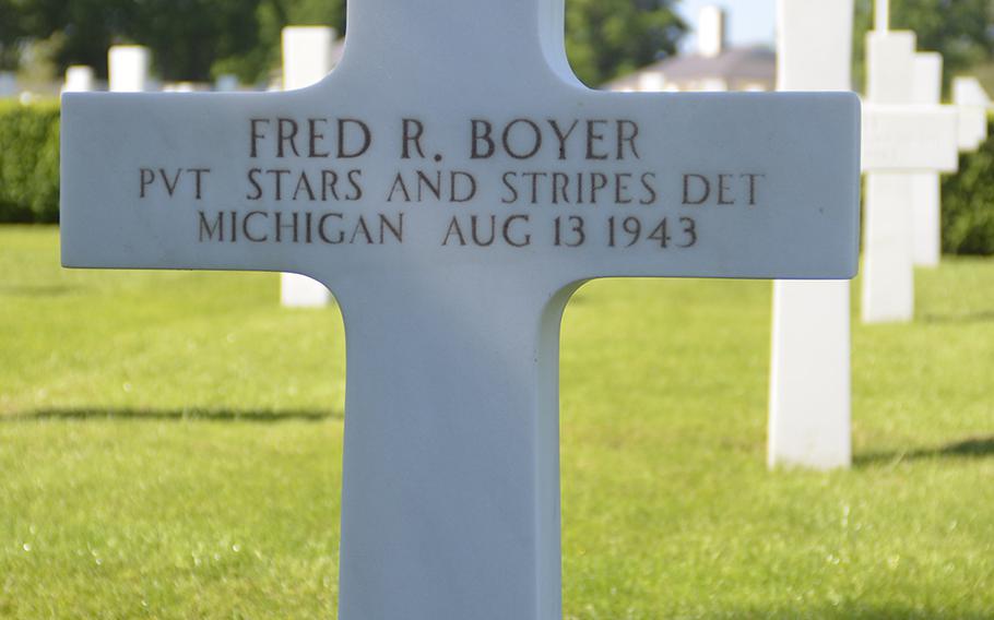 A headstone of a Stars and Stripes reporter at the Cambridge American Cemetery and Memorial in Cambridge, England, Friday, May, 26, 2017. The cemetery hosted Faces of Cambridge Memorial Day weekend.