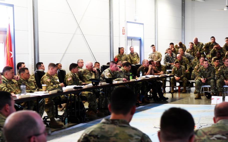 The command element of the U.S. 2nd Cavalry Regiment, leaders of the 7th Army Training Command and representatives from allied and partner nations discuss the upcoming Exercise Saber Guardian at the rehearsal of concept drill at Vilseck, Germany, Friday, June 9, 2017. 
