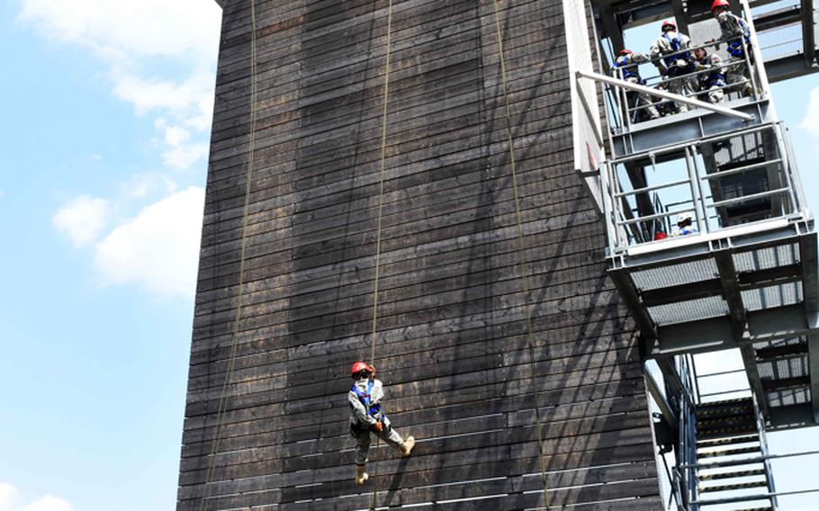 JROTC cadets from across Europe rappel down a tower Wednesday, June 21, 2017, at Grafenwoehr, Germany.
