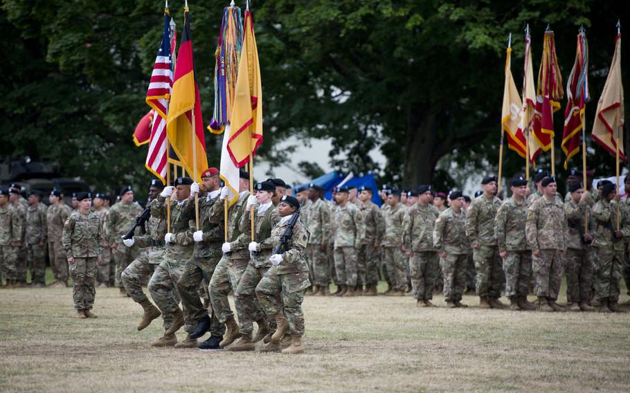 The color guard marches during the 21st Theater Sustainment Command change-of-command ceremony at Daenner Kaserne, Germany, on Friday, June 30, 2017.