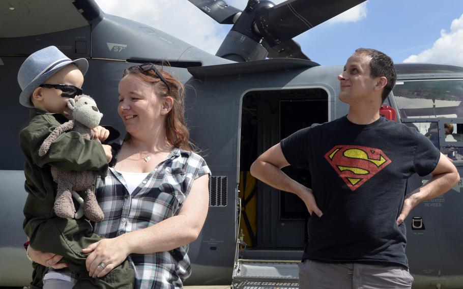 Keily and Martin Davidson with their 5-year-old son Jay near a CV-22 Osprey during a tour at RAF Mildenhall, England, Friday, July 7, 2017.