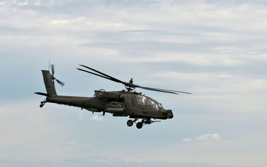 An AH-64 Apache of the 10th Combat Aviation Brigade goes in for an attack during a live-fire demonstration at the Center for Joint National Training in Cincu, Romania, Saturday, July 15, 2017. The demonstration was part of the U. S. Army Europe-led exercise Saber Guardian 2017.