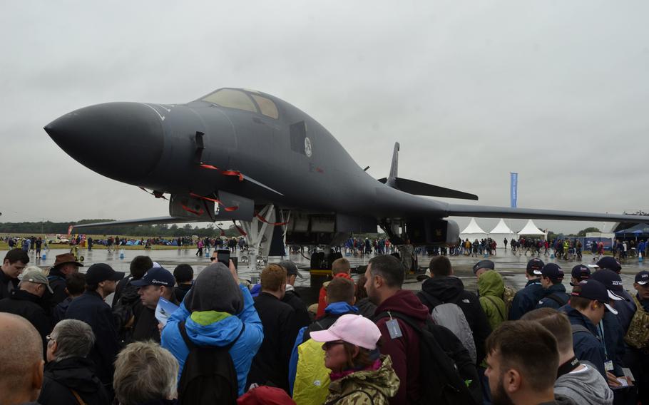 People crowd around a U.S. Air Force B-1B Lancer during the Royal International Air Tattoo at RAF Fairford, Saturday, July 15, 2017.